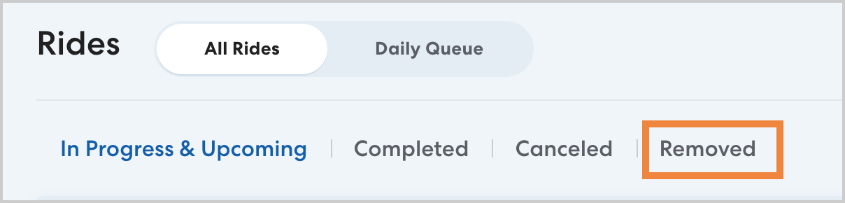 Rides section with tabs for 'All Rides' and 'Daily Queue.' Below are categories: 'In Progress & Upcoming,' 'Completed,' 'Canceled,' and 'Removed,' with 'Removed' highlighted.