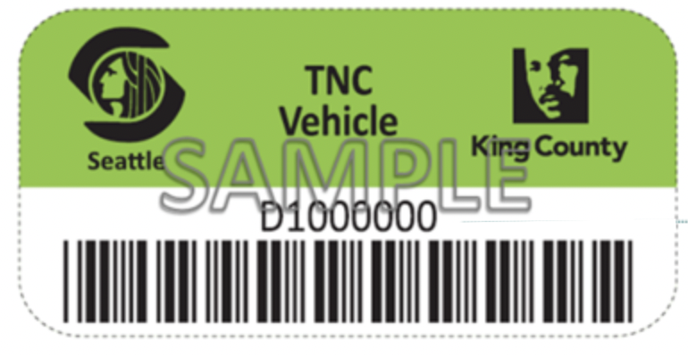 Sample TNC vehicle decal. The top half is green and has a logo for King County. The bottom half has a barcode.