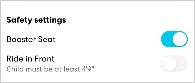Safety settings section showing toggles for 'Booster Seat' turned on and 'Ride in Front' turned off with a note that the child must be at least 4'9"